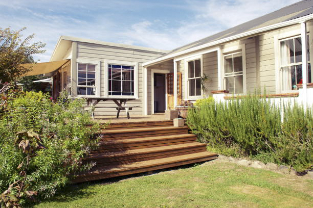 backyard with updated windows and nice deck to lawn